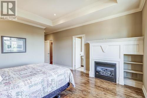 8293 Kipling Avenue, Vaughan, ON - Indoor Photo Showing Bedroom With Fireplace