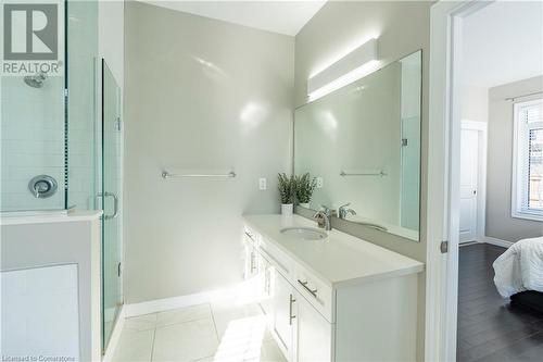 Bathroom with walk in shower, vanity, and tile patterned floors - 219 Falconridge Drive, Waterloo, ON - Indoor Photo Showing Bathroom