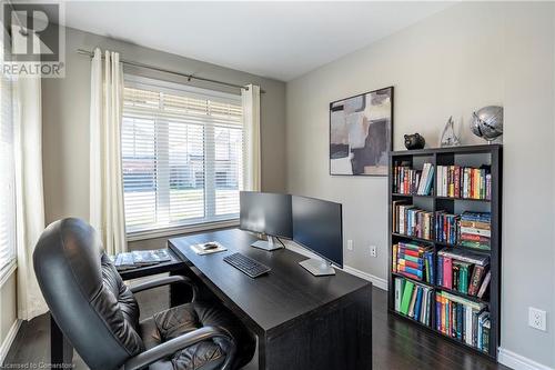 Office space featuring dark wood-type flooring - 219 Falconridge Drive, Kitchener, ON - Indoor Photo Showing Office