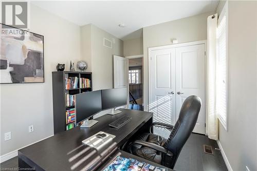 Home office featuring dark wood-type flooring - 219 Falconridge Drive, Waterloo, ON - Indoor Photo Showing Office