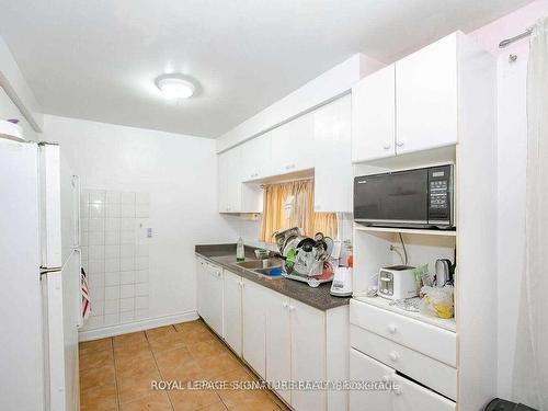 7615 Netherwood Rd, Mississauga, ON - Indoor Photo Showing Kitchen With Double Sink