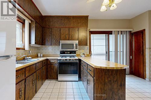 216 Wallace Avenue, Toronto, ON - Indoor Photo Showing Kitchen With Double Sink