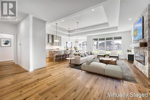 6748 Shaker Lane, Plympton-Wyoming, ON - Indoor Photo Showing Living Room With Fireplace