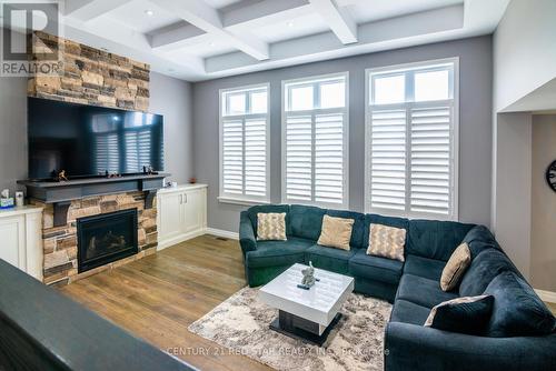 349 Munnoch Boulevard, Woodstock, ON - Indoor Photo Showing Living Room With Fireplace