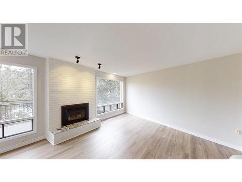 4383 Karindale Road, Kamloops, BC - Indoor Photo Showing Living Room With Fireplace