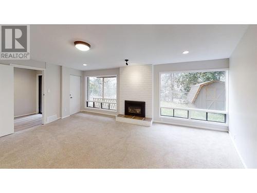 4383 Karindale Road, Kamloops, BC - Indoor Photo Showing Living Room With Fireplace