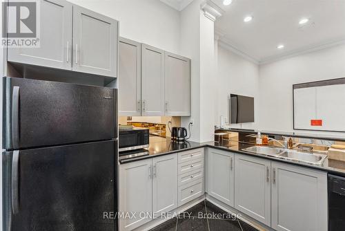 909 - 7 Lorraine Drive, Toronto, ON - Indoor Photo Showing Kitchen With Double Sink