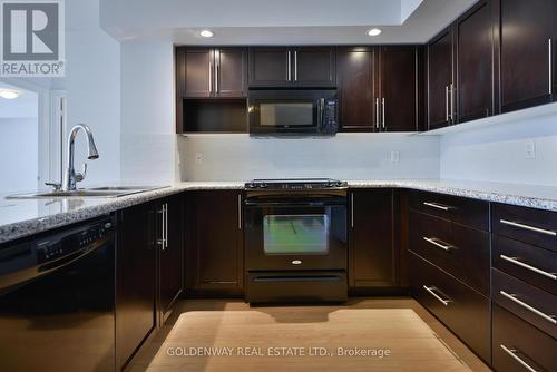 572 - 23 Cox Boulevard, Markham, ON - Indoor Photo Showing Kitchen With Upgraded Kitchen