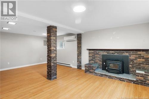 47 Christopher Drive, Burton, NB - Indoor Photo Showing Living Room With Fireplace