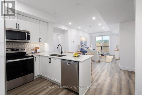 318 - 4 Kimberly Lane, Collingwood, ON - Indoor Photo Showing Kitchen With Double Sink With Upgraded Kitchen