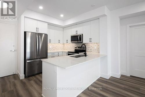 318 - 4 Kimberly Lane, Collingwood, ON - Indoor Photo Showing Kitchen With Double Sink With Upgraded Kitchen