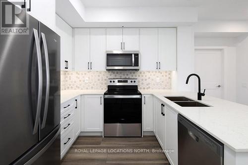 318 - 4 Kimberly Lane, Collingwood, ON - Indoor Photo Showing Kitchen With Double Sink With Upgraded Kitchen