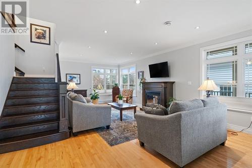 7 Atlantica Drive, Paradise, NL - Indoor Photo Showing Living Room With Fireplace