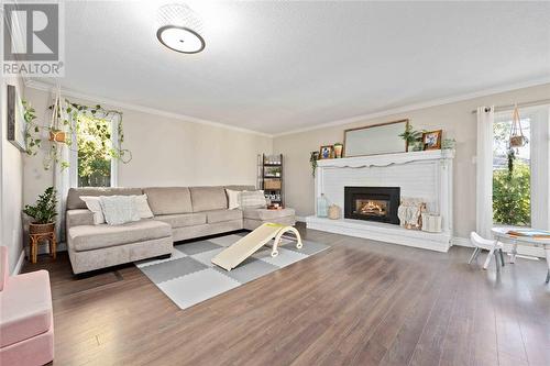 112 Chestnut Avenue, Sarnia, ON - Indoor Photo Showing Living Room With Fireplace