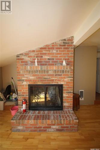 308 2Nd Avenue W, Frontier, SK - Indoor Photo Showing Living Room With Fireplace