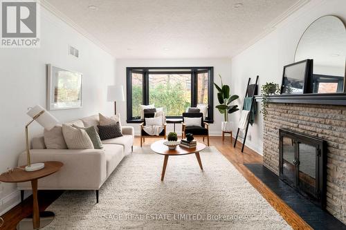 149 Glenwood Crescent, Toronto, ON - Indoor Photo Showing Living Room With Fireplace