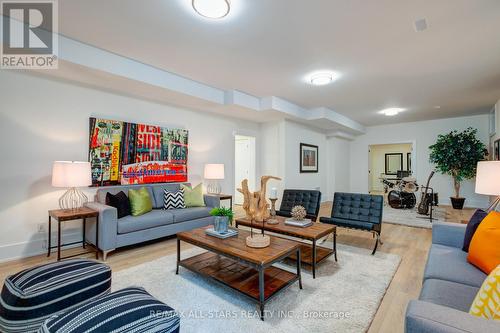 4 Tredvalley Grove, Toronto, ON - Indoor Photo Showing Living Room