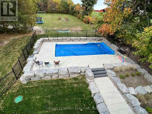 64 Bradley Boulevard, Clarington, ON - Outdoor With In Ground Pool With Backyard