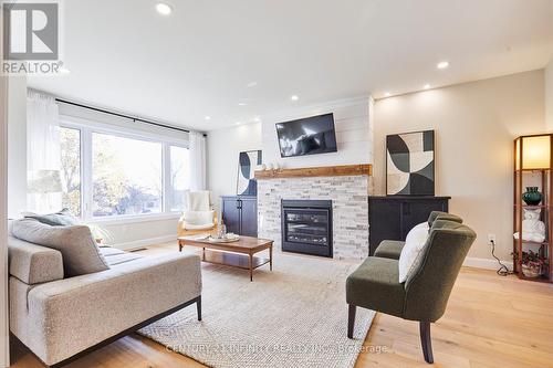 64 Bradley Boulevard, Clarington, ON - Indoor Photo Showing Living Room With Fireplace