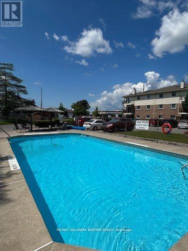 202B - 221 North Park Street, Belleville, ON - Outdoor With In Ground Pool