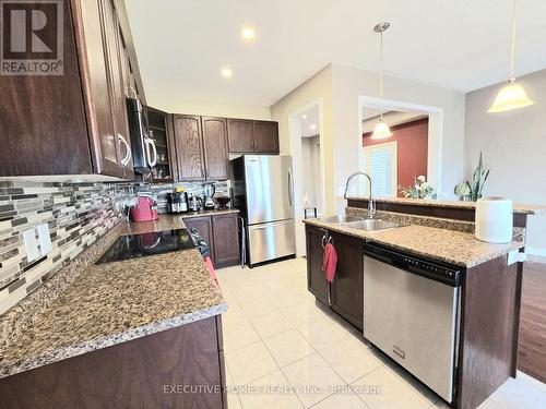 46 Versailles Crescent, Brampton, ON - Indoor Photo Showing Kitchen With Stainless Steel Kitchen With Double Sink