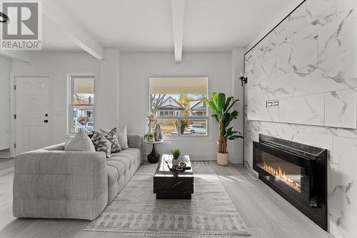 1412 Lincoln Road, Windsor, ON - Indoor Photo Showing Living Room With Fireplace