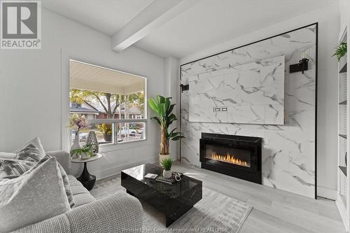 1412 Lincoln Road, Windsor, ON - Indoor Photo Showing Living Room With Fireplace