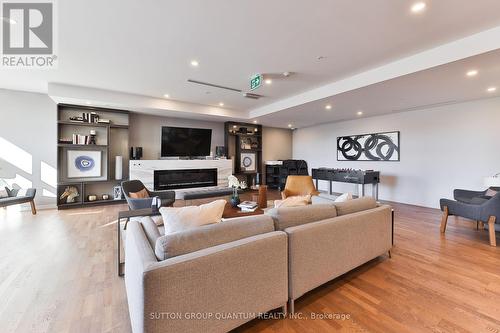 418 - 457 Plains Road E, Burlington, ON - Indoor Photo Showing Living Room With Fireplace