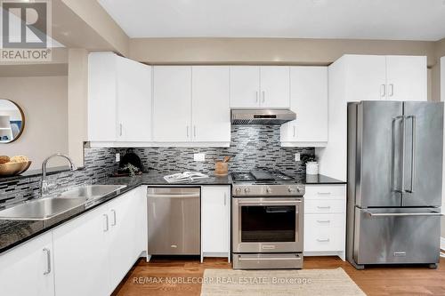 8 - 275 Van Dusen Boulevard, Toronto, ON - Indoor Photo Showing Kitchen With Stainless Steel Kitchen With Upgraded Kitchen