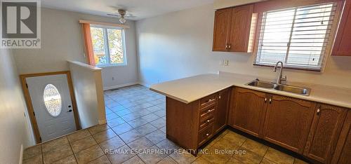 61 East 26Th Street, Hamilton, ON - Indoor Photo Showing Kitchen With Double Sink