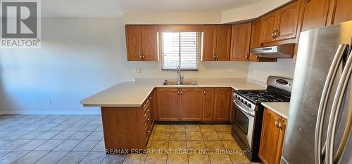 61 East 26Th Street, Hamilton, ON - Indoor Photo Showing Kitchen With Stainless Steel Kitchen With Double Sink