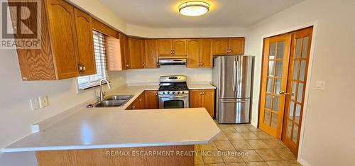 61 East 26Th Street, Hamilton, ON - Indoor Photo Showing Kitchen With Stainless Steel Kitchen With Double Sink