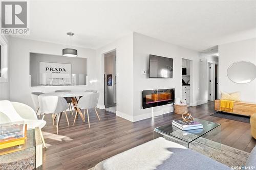 19 Cantlon Crescent, Saskatoon, SK - Indoor Photo Showing Living Room With Fireplace