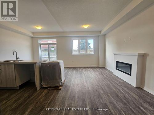 1534 Wheatcroft Drive, Oshawa, ON - Indoor Photo Showing Living Room With Fireplace