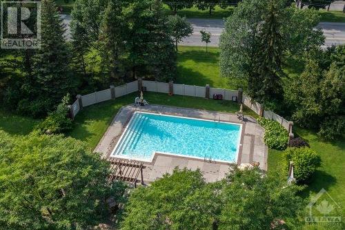 1025 Grenon Avenue Unit#201, Ottawa, ON - Outdoor With In Ground Pool With Backyard