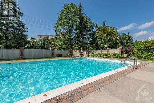 1025 Grenon Avenue Unit#201, Ottawa, ON - Outdoor With In Ground Pool With Backyard