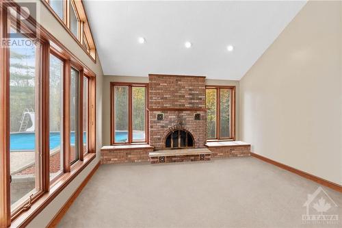 7 Rolston Way, Ottawa, ON - Indoor Photo Showing Other Room With Fireplace