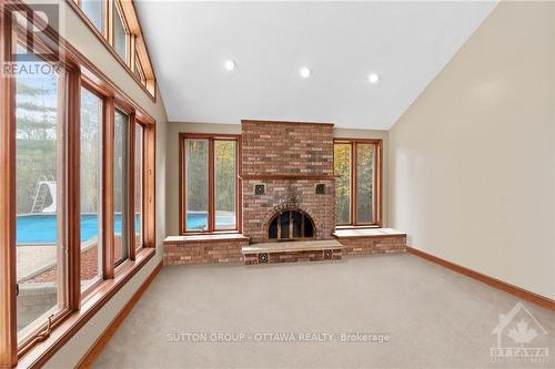 7 Rolston Way, Ottawa, ON - Indoor Photo Showing Other Room With Fireplace