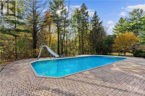 7 Rolston Way, Ottawa, ON - Outdoor With In Ground Pool With Backyard