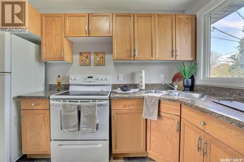 3704 Sherwood Drive, Regina, SK - Indoor Photo Showing Kitchen With Double Sink