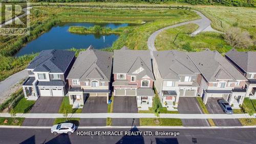 3283 Turnstone Boulevard, Pickering, ON -  With Body Of Water With Facade With View