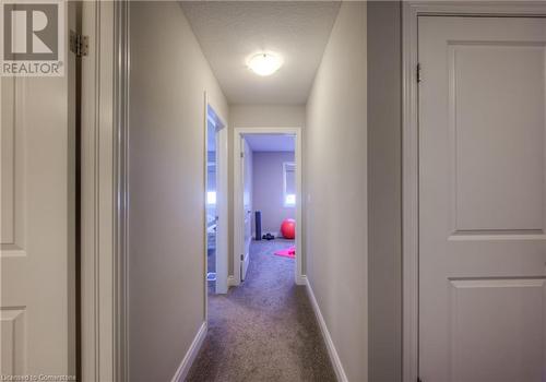 Upper hallway leading to bedrooms. - 625 Blackbridge Road Unit# 12, Cambridge, ON - Indoor Photo Showing Other Room