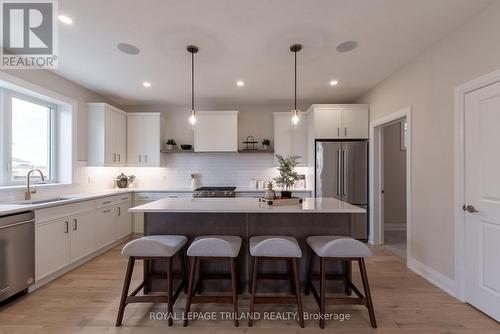 16 Allister Drive, Middlesex Centre, ON - Indoor Photo Showing Kitchen With Upgraded Kitchen