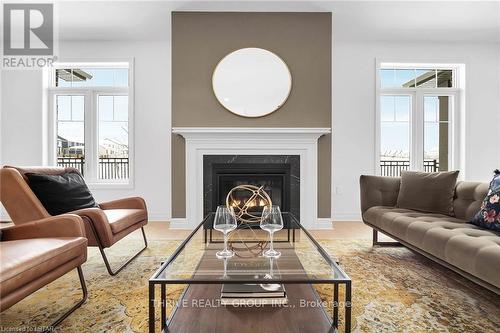 15 - 1080 Upperpoint Avenue, London, ON - Indoor Photo Showing Living Room With Fireplace