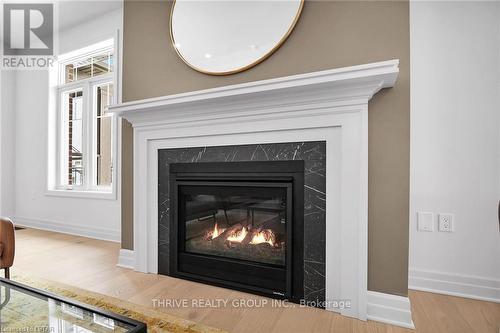 15 - 1080 Upperpoint Avenue, London, ON - Indoor Photo Showing Living Room With Fireplace