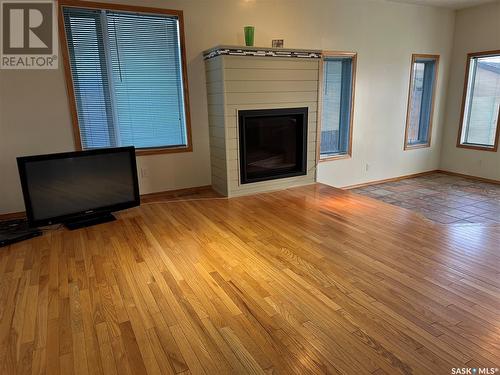 723 Dieppe Drive, Weyburn, SK - Indoor Photo Showing Other Room With Fireplace