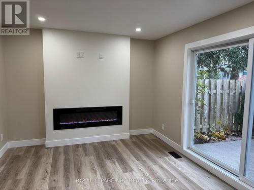 51 - 242 Lakeport Road, St. Catharines (443 - Lakeport), ON - Indoor With Fireplace