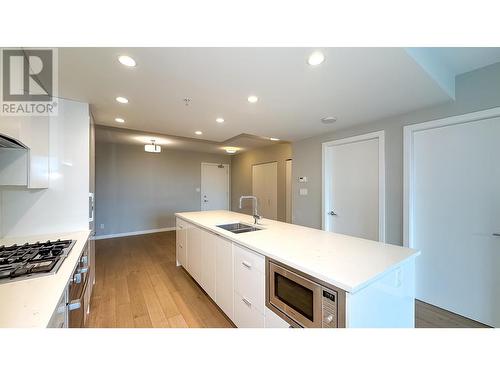 702 2888 Cambie Street, Vancouver, BC - Indoor Photo Showing Kitchen With Double Sink