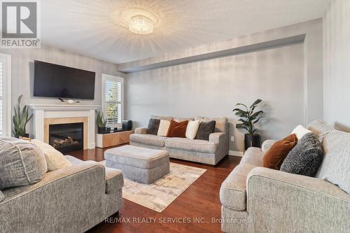 22 Vontress Street, Brampton, ON - Indoor Photo Showing Living Room With Fireplace