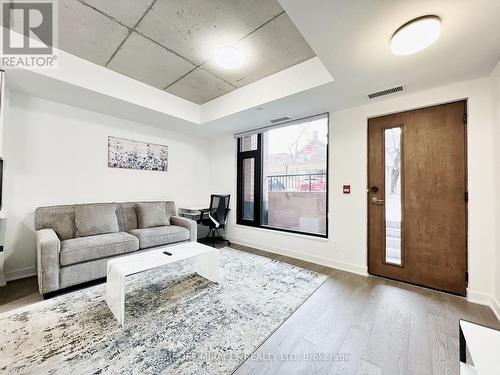 105 - 7 Watkinson Avenue, Toronto, ON - Indoor Photo Showing Living Room